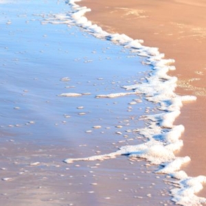 Espuma na Areia
